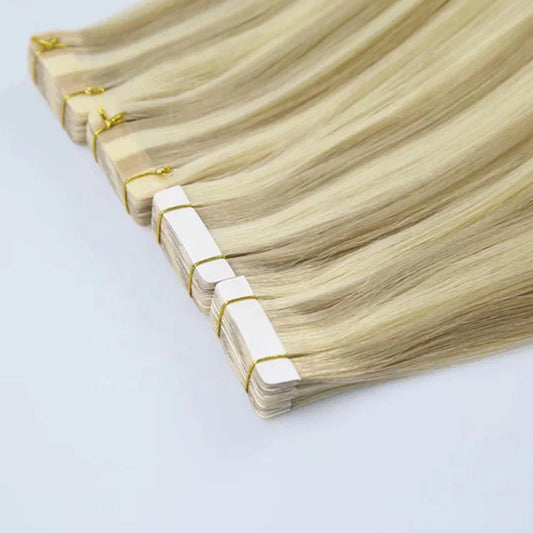 H0183d027aa41472e94207df7f4622855I.jpg blonde tape in hair extensions